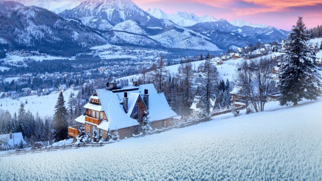 Night view of the ski and tourist resort of the Polish city of Zakopane with Mount Gubalowka and the steep slopes of the Polish Tatras